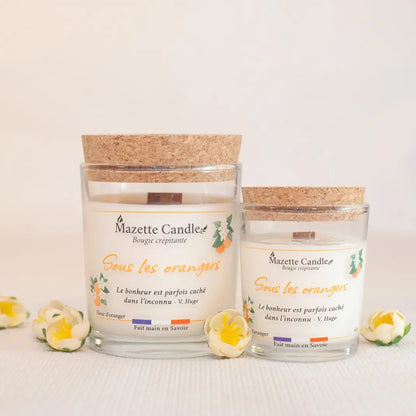 Deux bougies Mazette Candle Sous les orangers 65g et 150g parfum fleur d’oranger, avec couvercles en liège, fleurs en décor